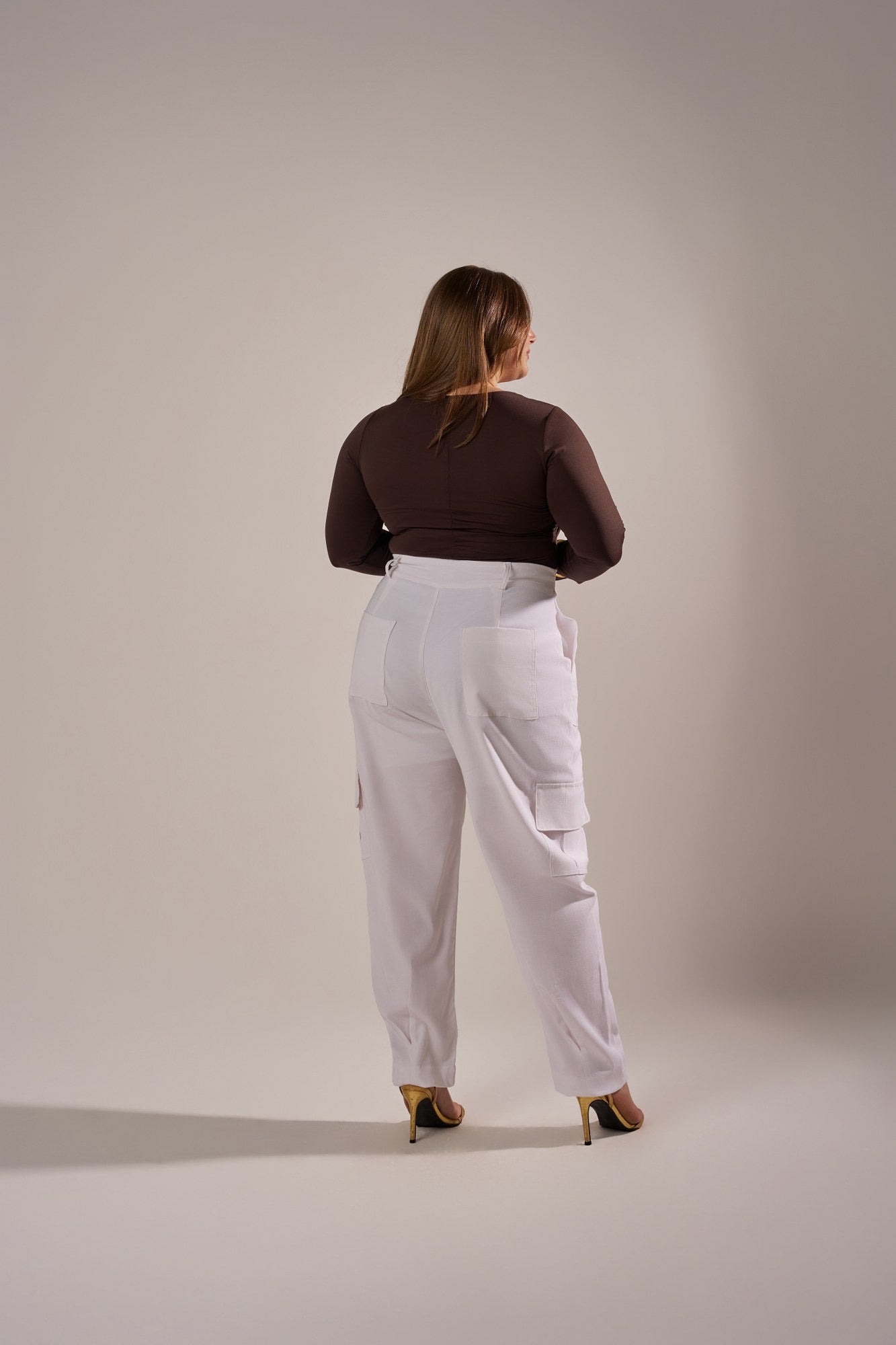 BODY MANGA LONGA COM AJUSTE METÁLICO