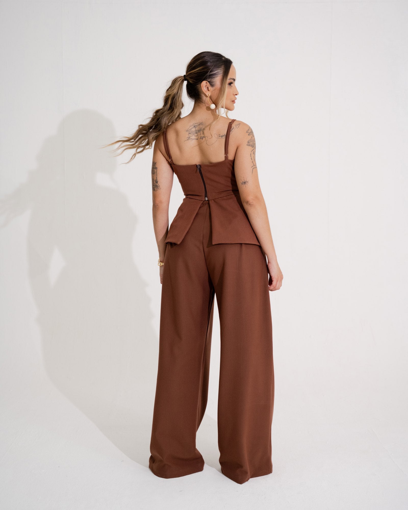 BLUSA PEPLUM ASSIMÉTRICO COM LAPELAS